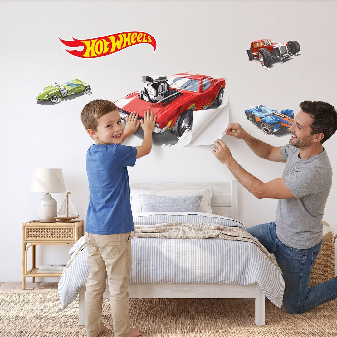 Hot Wheels Hot Rod Heroes Wall Sticker Decals wall decals: a boy and his dad putting the decals up in a boy's bedroom