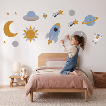 Little Rocket Scandi Space Set Wall Sticker Decals wall decals: a girl putting the decals up in a girl's bedroom