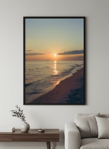 Modern wall art styled above a sofa in a neutral living room