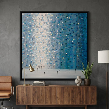 Canvas wall art with a black surround styled in a bright modern office