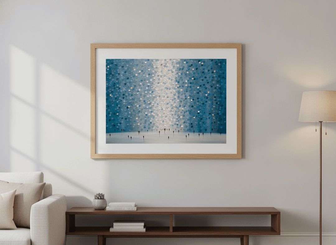 Modern wall art styled above a sofa in a neutral living room