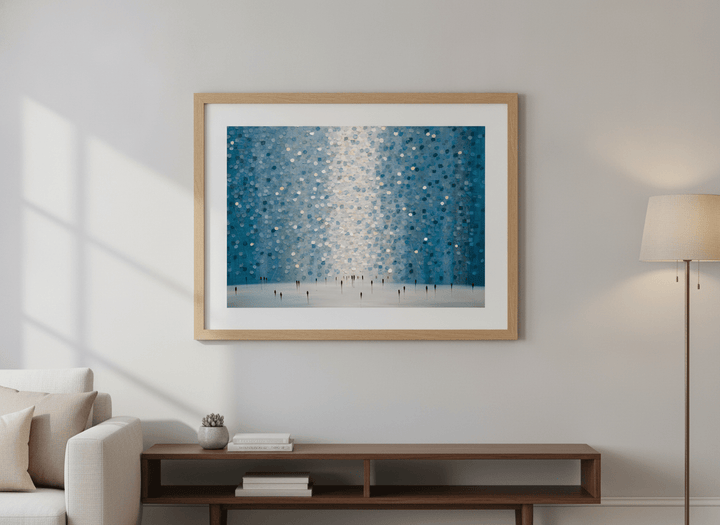 Modern wall art styled above a sofa in a neutral living room