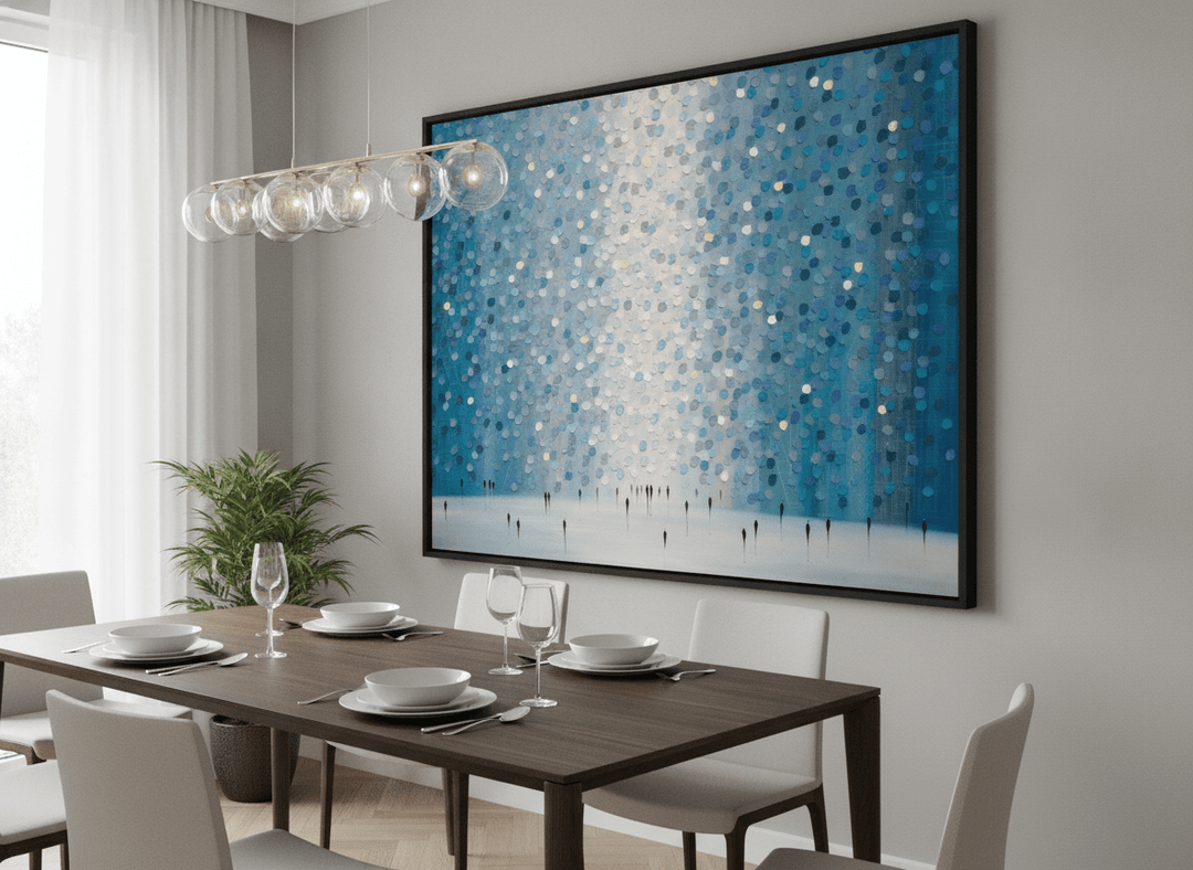 Wall art styled above a dining table in a contemporary home