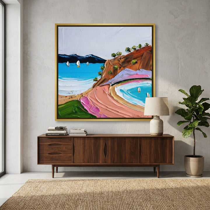 Canvas wall art with a gold leaf surround styled in a bright modern office
