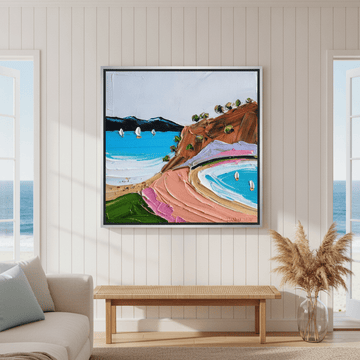Oversized statement canvas wall art with a silver leaf surround styled in a sunny coastal beach house