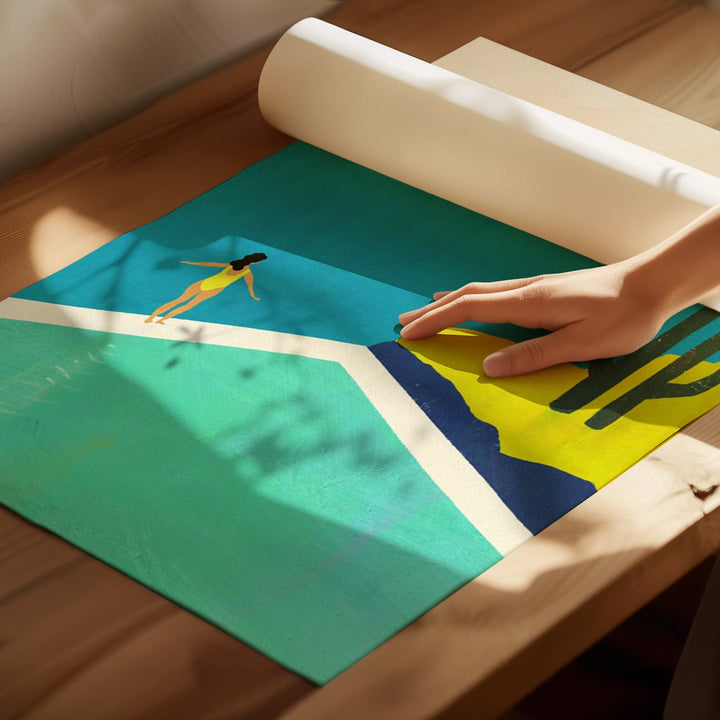 Person rolling out a colorful yoga mat with a design of a person in a pool.