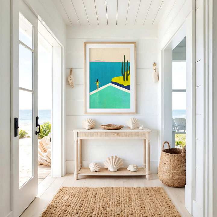 Nautical-themed interior with a console table, shell decorations, and a beach-themed painting.