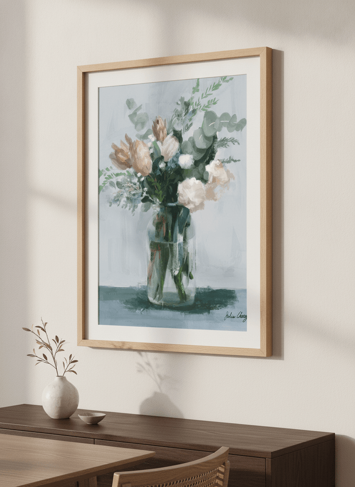 Wall art styled above a dining table in a contemporary home