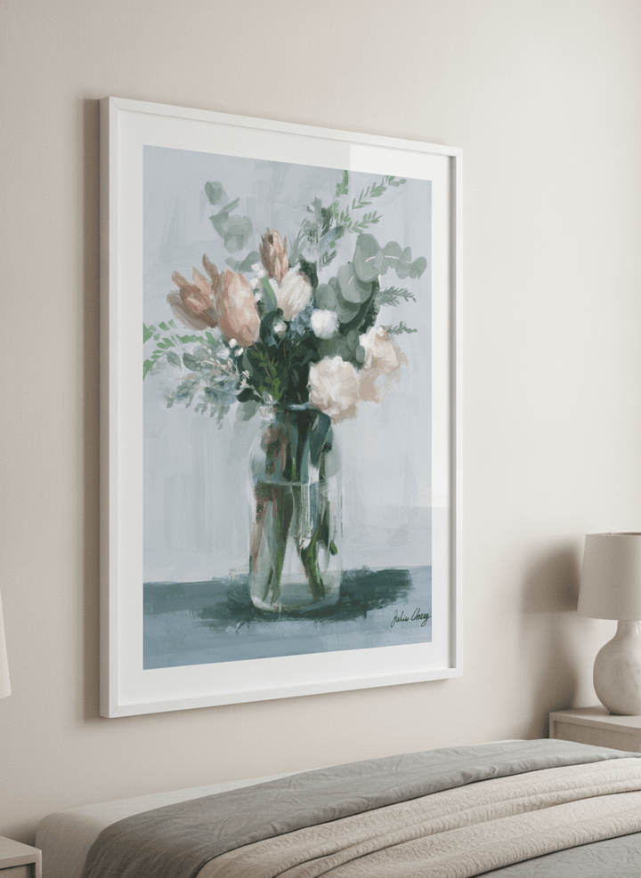 Minimalist artwork displayed in a calm, light-filled bedroom interior