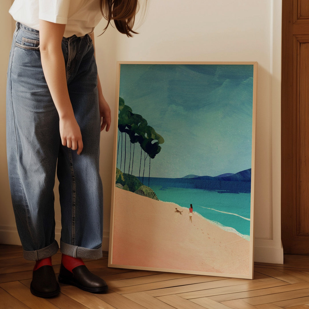 Person standing next to a painting of a beach scene