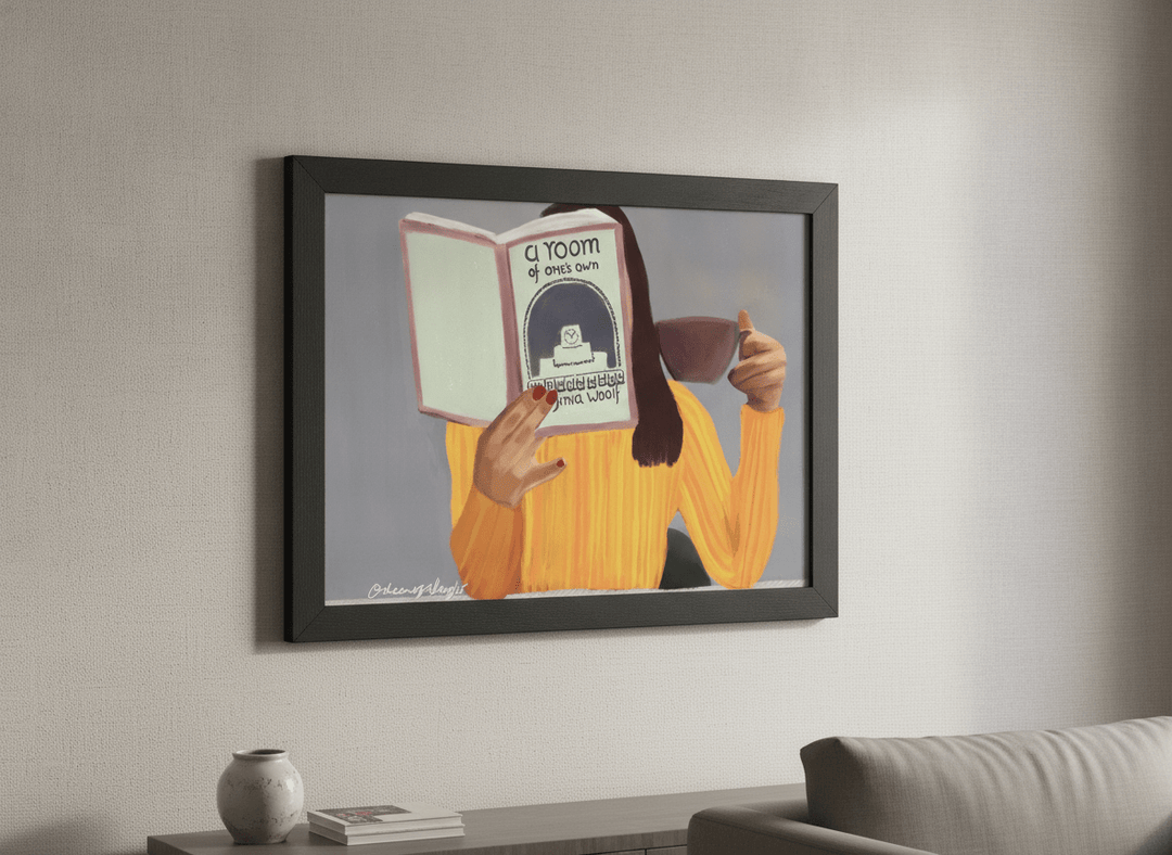 Modern wall art styled above a sofa in a neutral living room