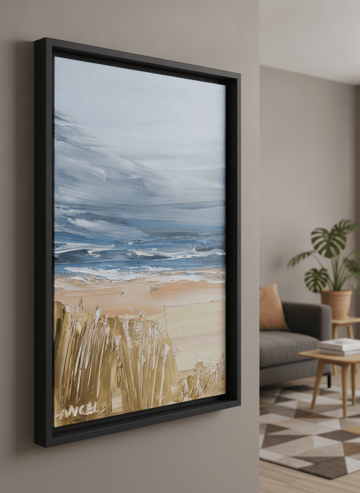 Modern wall art styled above a sofa in a neutral living room