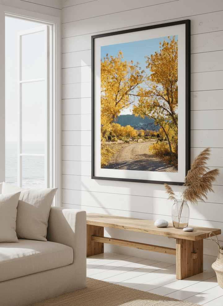 Neutral wall art displayed in a sunny coastal beach house