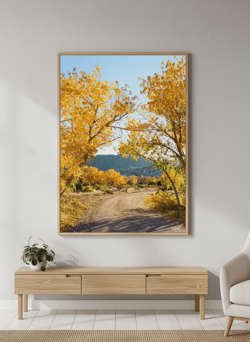 Modern wall art styled above a sofa in a neutral living room