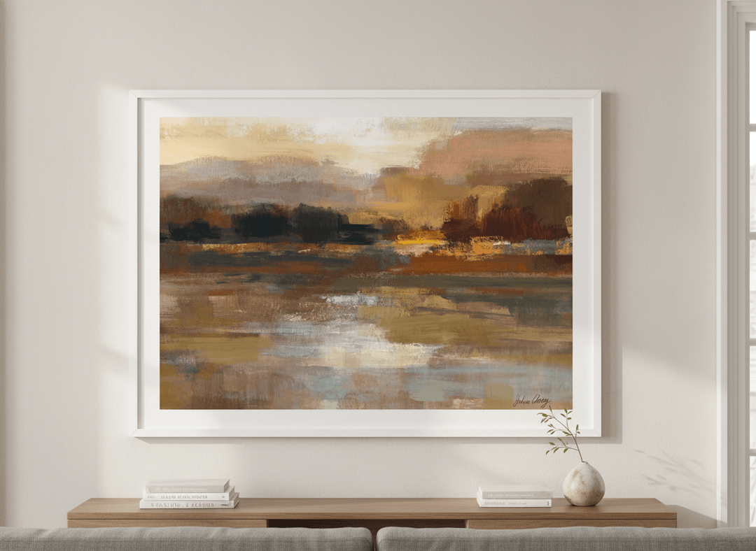 Modern wall art styled above a sofa in a neutral living room
