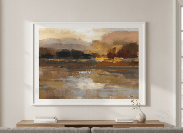 Modern wall art styled above a sofa in a neutral living room