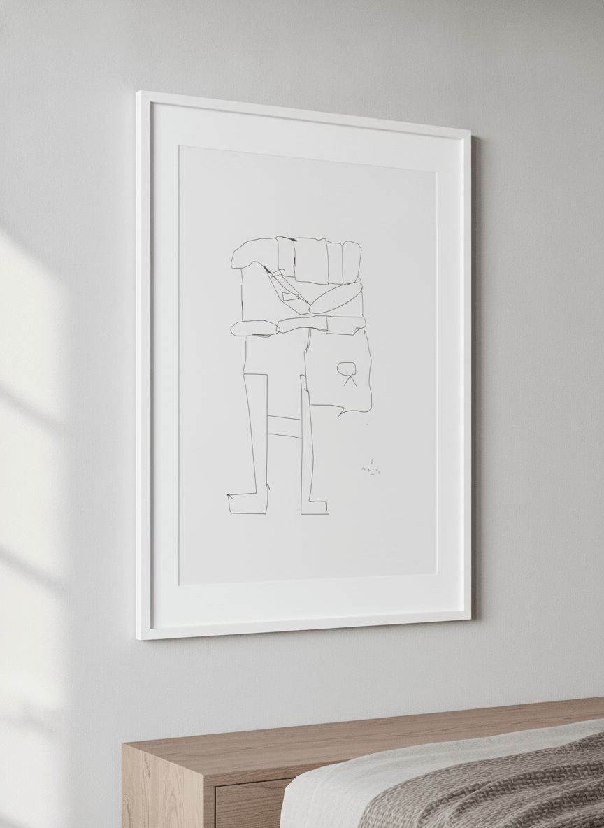 Minimalist artwork displayed in a calm, light-filled bedroom interior