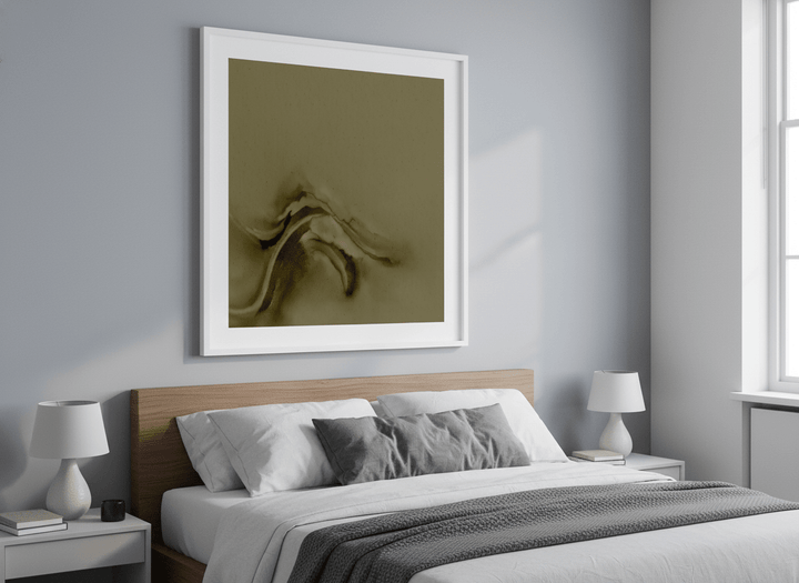 Minimalist artwork displayed in a calm, light-filled bedroom interior