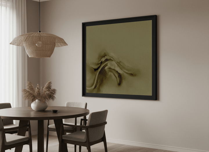 Wall art styled above a dining table in a contemporary home