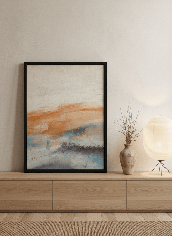 Modern wall art print standing on a sideboard in a warm Japandi bedroom