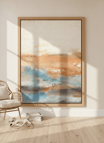 Oversized statement modern wall art print leaning against the wall in a coastal dining room