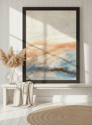 Modern wall art print standing on a console in a coastal bedroom