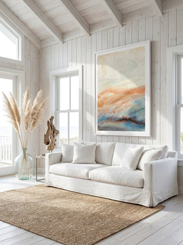 Oversized statement modern wall art print styled on the wall in a coastal living room