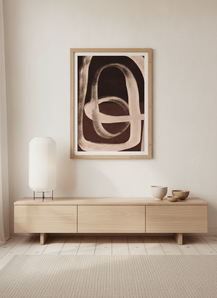 Modern wall art print styled on the wall in a warm Japandi living room
