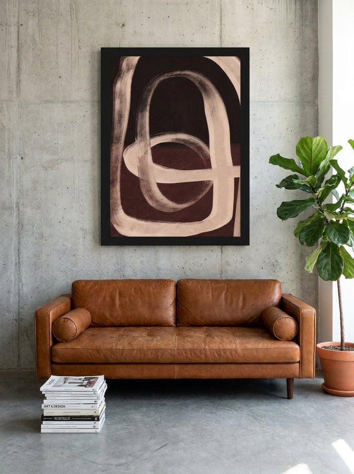 Modern wall art print styled on the wall in an industrial loft living room
