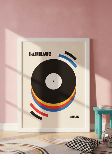 Oversized statement modern wall art print leaning against the wall in a colourful eclectic living room
