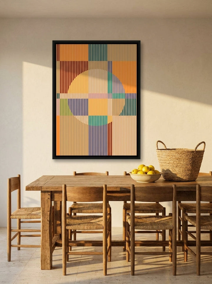 Canvas wall art with a black surround styled on the wall in a Mediterranean dining room