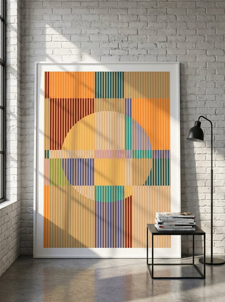 Oversized statement modern wall art print leaning against the wall in an industrial loft living room