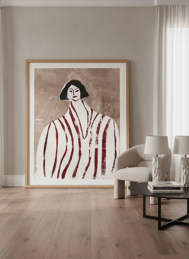 Oversized statement modern wall art print leaning against the wall in a luxe living room