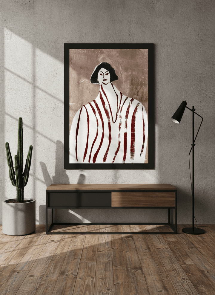 Modern wall art print standing on a console in an industrial loft living room