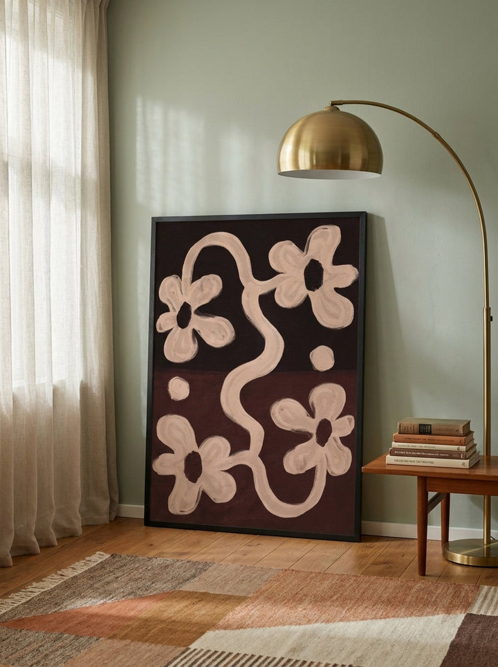 Oversized statement modern wall art print leaning against the wall in a mid-century living room