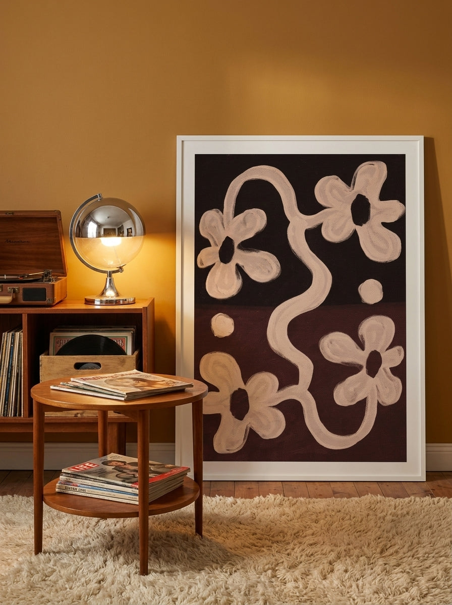 Oversized statement modern wall art print leaning against the wall in a retro 70s dining room