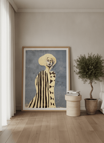 Oversized statement modern wall art print leaning against the wall in a luxe bedroom