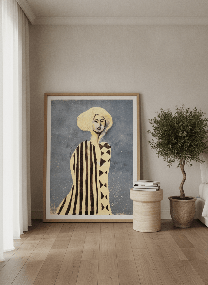 Oversized statement modern wall art print leaning against the wall in a luxe bedroom