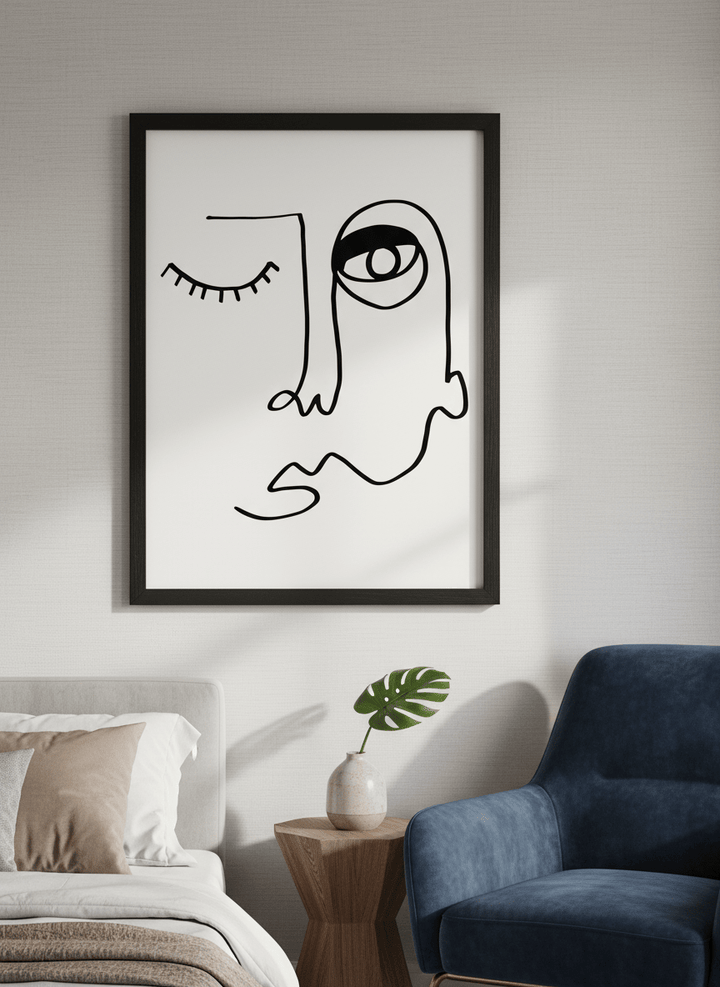 Minimalist artwork displayed in a calm, light-filled bedroom interior