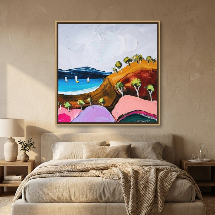 Canvas wall art with a natural timber surround styled in a calm, light-filled bedroom