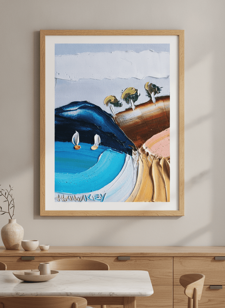 Wall art styled above a dining table in a contemporary home