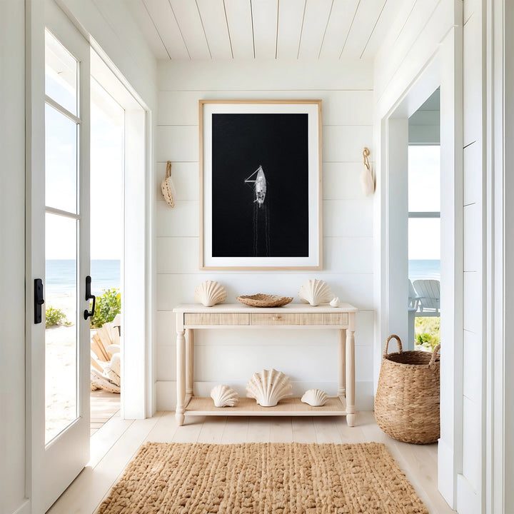 Nautical-themed interior with shell decorations and a picture on a wall.