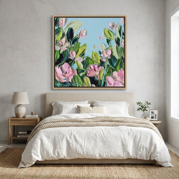 Canvas wall art with a natural timber surround styled in a calm, light-filled bedroom