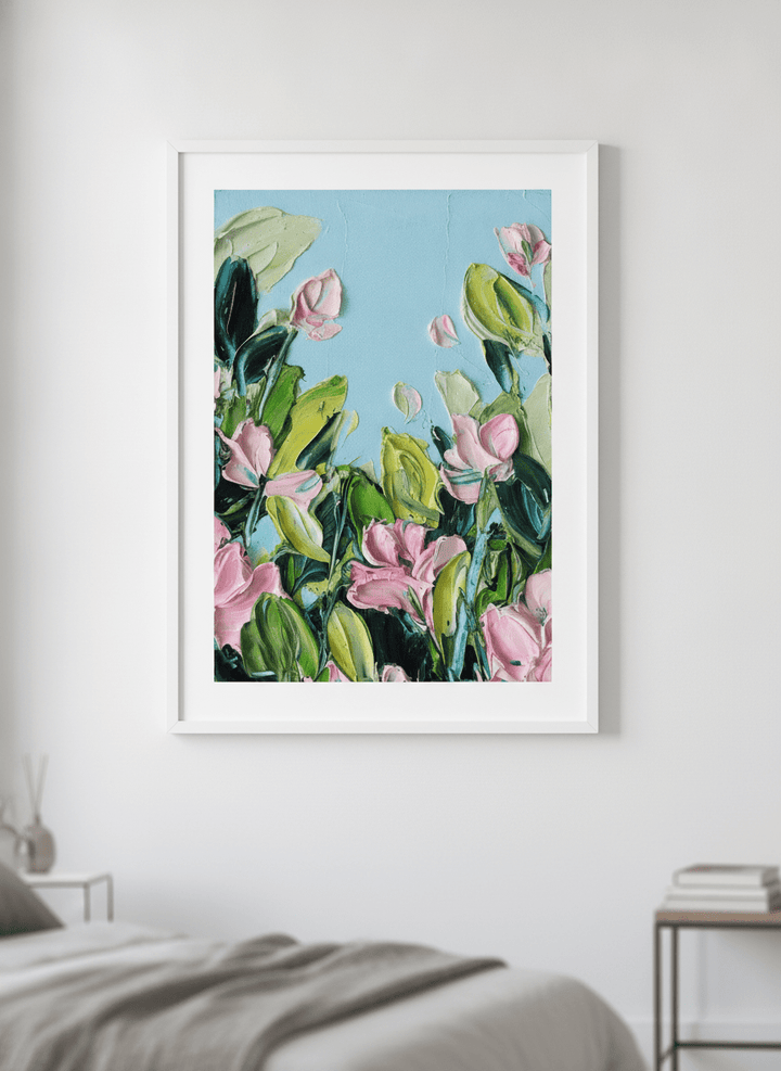 Minimalist artwork displayed in a calm, light-filled bedroom interior