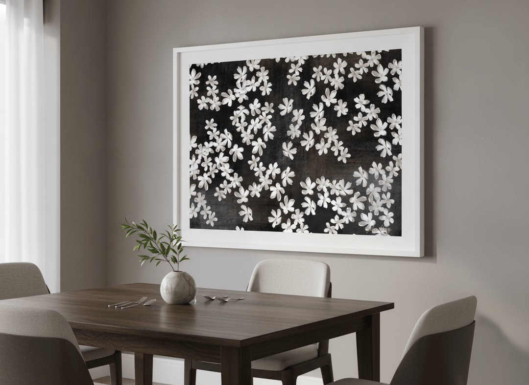 Wall art styled above a dining table in a contemporary home