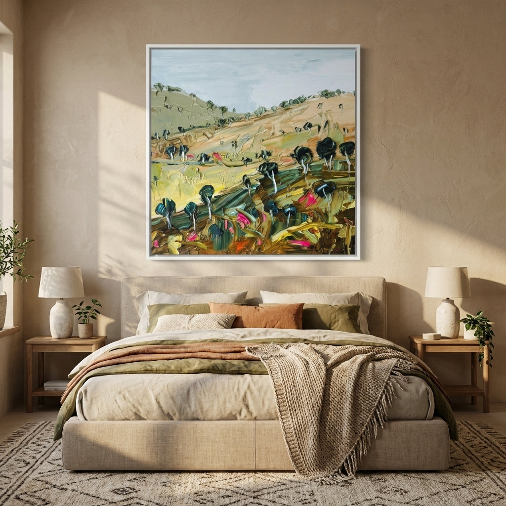 Canvas wall art with a white surround styled in a calm, light-filled bedroom