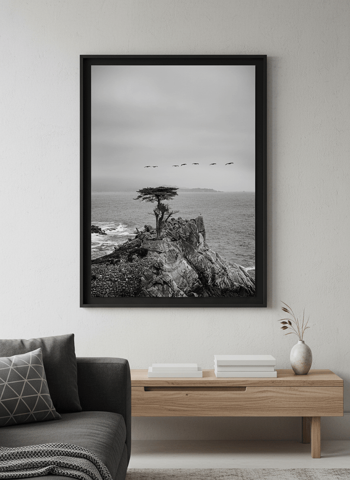 Modern wall art styled above a sofa in a neutral living room