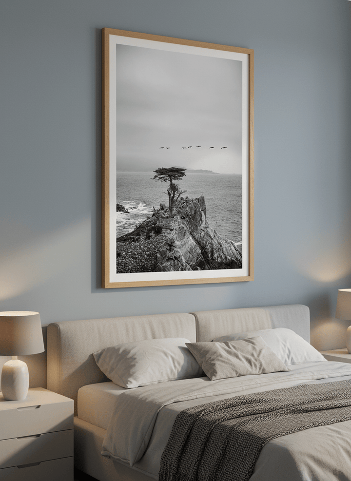 Minimalist artwork displayed in a calm, light-filled bedroom interior