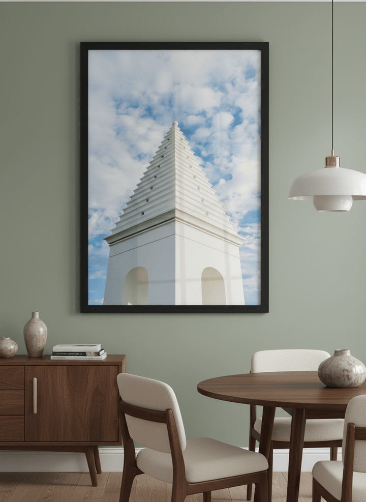 Wall art styled above a dining table in a contemporary home