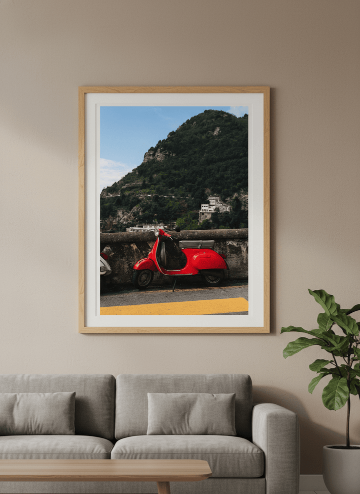 Modern wall art styled above a sofa in a neutral living room